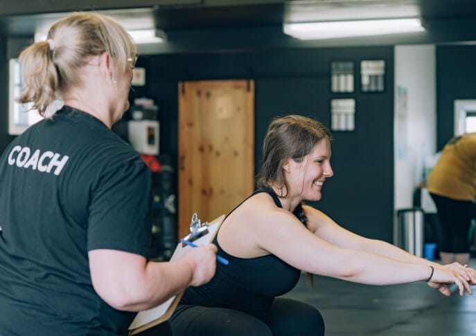 Women training with her coach